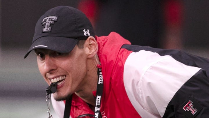 Texas Tech's tight ends coach Josh Cochran prepares to blow the whistle during football practice,