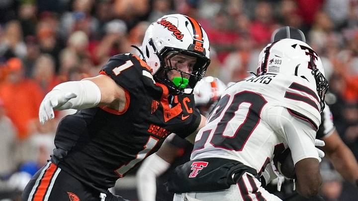 Oregon State's Dylan Layne, left, tackles Texas Tech's J'Koby Williams during an NCAA football game at Reser Stadium on Saturday, Sept. 12, 2026, in Corvallis, Oregon Oregon State's Dylan Layne, left, tackles Texas Tech's J'Koby Williams during an NCAA football game at Reser Stadium on Saturday, Sept. 12, 2026, in Corvallis, Oregon