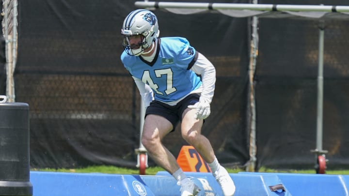 Jun 11, 2025; Charlotte, NC, USA; Carolina Panthers linebacker Josey Jewell (47) performs a mobility drill during minicamp at Bank of America Stadium.