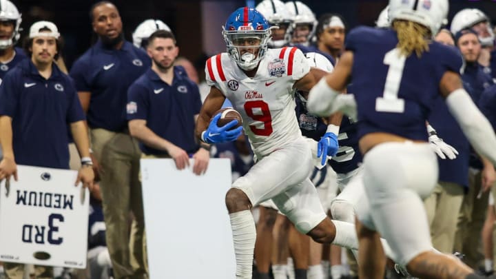 Dec 30, 2023; Atlanta, GA, USA; Mississippi Rebels wide receiver Tre Harris (9) runs after a catch against the Penn State Nittany Lions in the second half at Mercedes-Benz Stadium. Mandatory Credit: Brett Davis-USA TODAY Sports