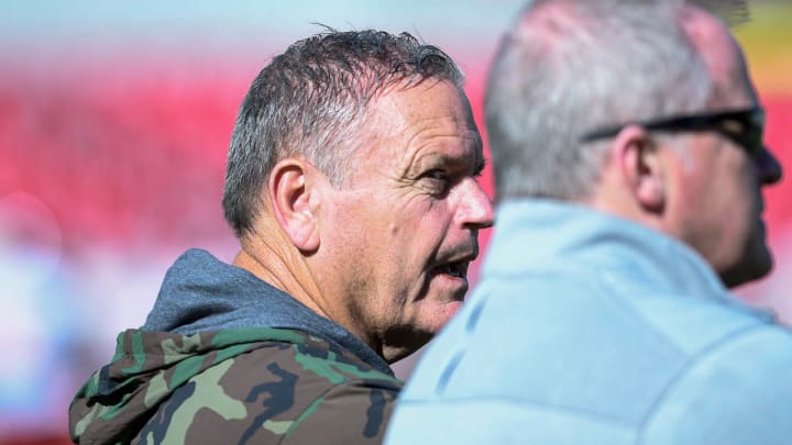 Arkansas Razorbacks coach Sam Pittman talking with athletics director Hunter Yurachek at a spring practice inside Razorback Stadium in Fayetteville, Ark.