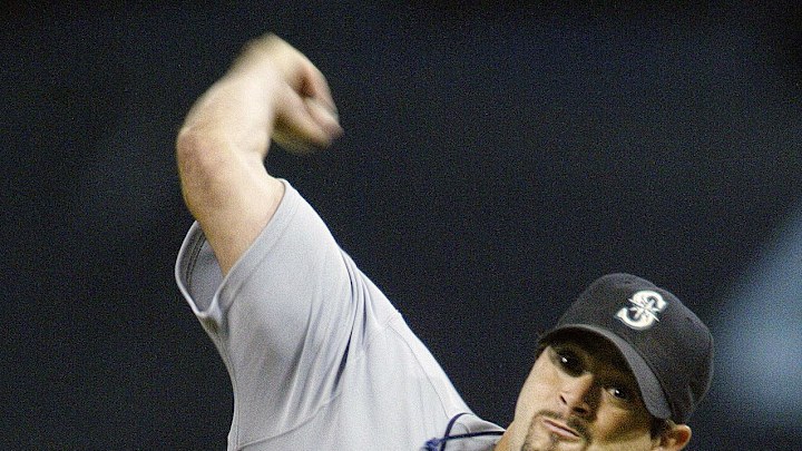 Seattle Mariners pitcher #38 Joel Pineiro pitches to the Minnesota Twins in the third inning at the Metrodome in 2005.