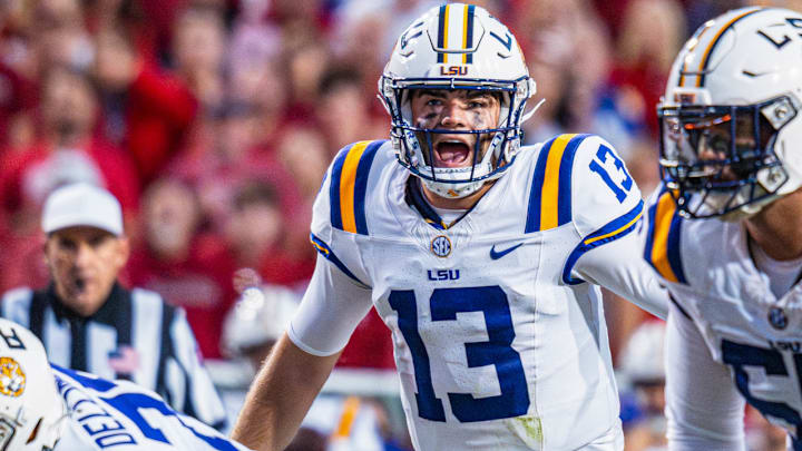 LSU Tigers quarterback Garrett Nussmeier calling plays for his offense against the Arkansas Razorbacks at Razorback Stadium on Saturday night.