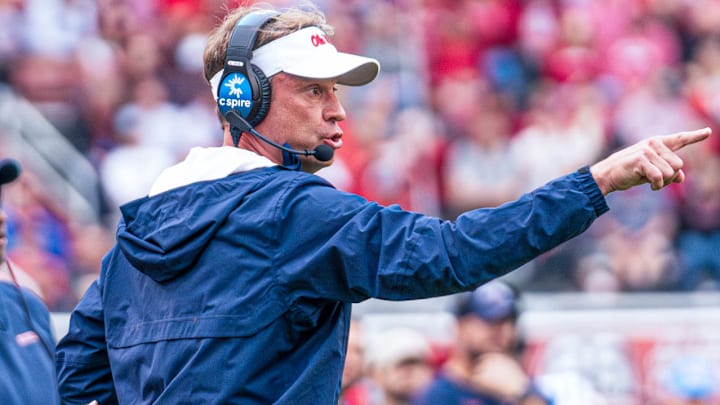 Ole Miss Rebels coach Lane Kiffin points at his players during game with the Arkansas Razorbacks at Razorback Stadium in Fayetteville, Ark. Ole Miss Rebels coach Lane Kiffin points at his players during game with the Arkansas Razorbacks at Razorback Stadium in Fayetteville, Ark.
