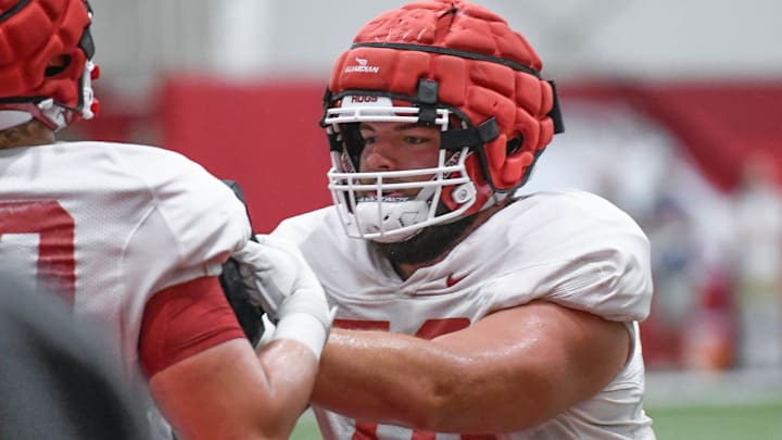 Arkansas Razorbacks offensive lineman Joshua Braun going through practices in August at the indoor facility in Fayetteville, Ark.
