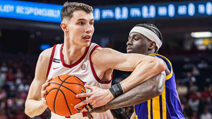 Arkansas Razorbacks forward Zvonimir battles LSU defender for position down low in a game at Bud Walton Arena in Fayetteville, Ark. Arkansas Razorbacks forward Zvonimir battles LSU defender for position down low in a game at Bud Walton Arena in Fayetteville, Ark.