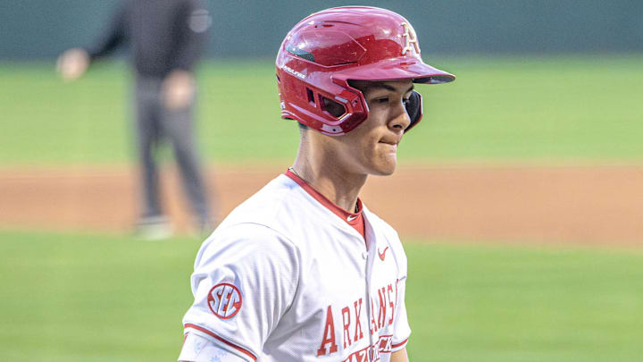 Arkansas Razorbacks second baseman Nick Souza walks back to the dugout after an at-bat against Missouri State at Baum-Walker Stadium in Fayetteville, Ark.