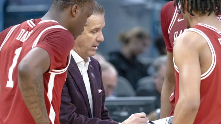 Arkansas Razorbacks coach John Calipari drawing a play in the Sweet 16 against the Texas Tech Red Raiders in Chase Arena in San Francisco.