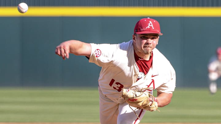 Arkansas Razorbacks relief pitcher Steele Eaves throws a pitch from the mound against the Little Rock Trojans at Baum-Walker Stadium in Fayetteville, Ark