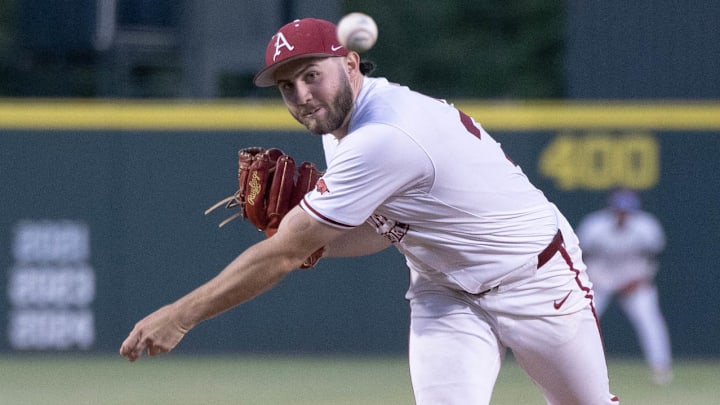 Arkansas Razorbacks pitcher Zach Root throws a pitch against the Texas Longhorns. The Razorbacks blanked the Longhorns 9-0 in the series opener. Arkansas Razorbacks pitcher Zach Root throws a pitch against the Texas Longhorns. The Razorbacks blanked the Longhorns 9-0 in the series opener.