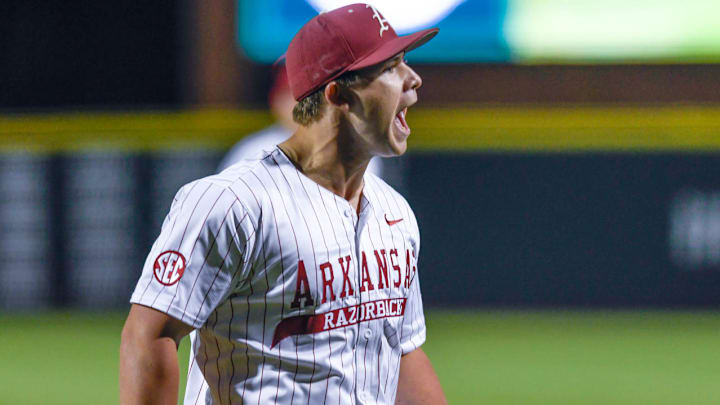 An emotional Arkansas Razorbacks pitcher Gage Wood reacts to the crowd after a strikeout against the Texas Longhorns at Baum-Walker Stadium in Fayetteville, Ark. An emotional Arkansas Razorbacks pitcher Gage Wood reacts to the crowd after a strikeout against the Texas Longhorns at Baum-Walker Stadium in Fayetteville, Ark.