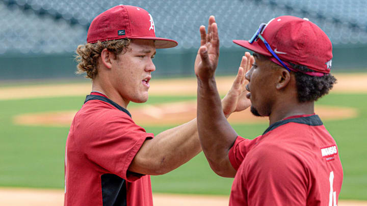 Arkansas Razorbacks Cam Kozeal and Justin Thomas, Jr., during practice for the NCAA Regional against North Dakota State on Friday.