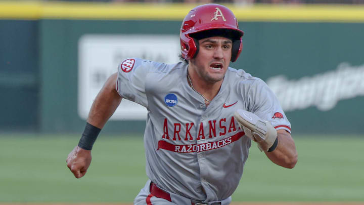 Catcher Ryder Helfrick rounds third in the third inning in a regional game against Creighton. The Razorbacks won 12-1 to advance to the final Catcher Ryder Helfrick rounds third in the third inning in a regional game against Creighton. The Razorbacks won 12-1 to advance to the final