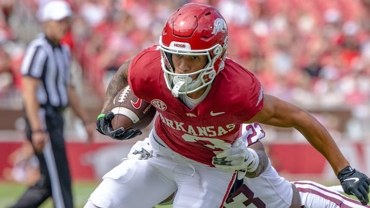 Arkansas Razorbacks wide receiver CJ Brown breaking a tackle against the Alabama A&M Bulldogs at Razorback Stadium in Fayetteville, Ark. Arkansas Razorbacks wide receiver CJ Brown breaking a tackle against the Alabama A&M Bulldogs at Razorback Stadium in Fayetteville, Ark.