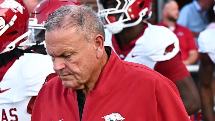 Arkansas Razorbacks coach Sam Pittman on the field before a game with the Ole Miss Rebels at Vaught-Hemingway Stadium in Oxford, Miss.