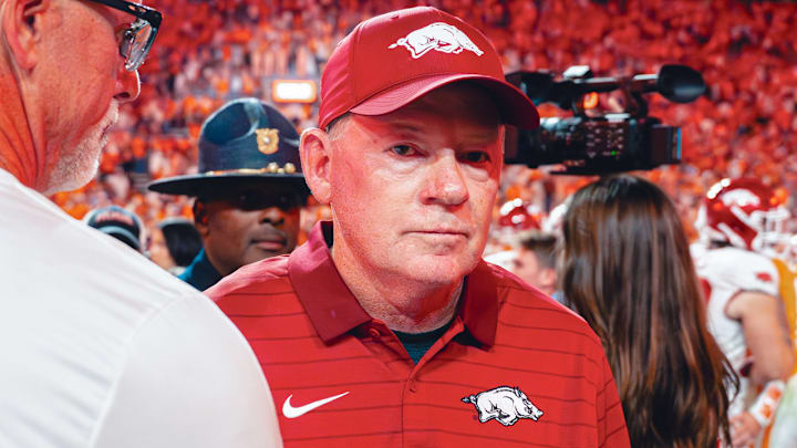 Arkansas Razorbacks interim coach Bobby Petrino walks off the field after loss to the Tennessee Volunteers at Neyland Stadium in Knoxville, Tenn.