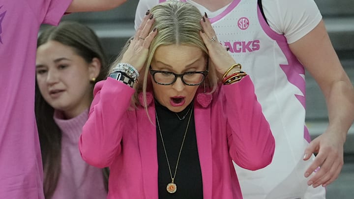 Arkansas Razorbacks coach Kelsi Musick on the sidelines in a game against the Missouri Tigers at Bud Walton Arena in Fayetteville, Ark.