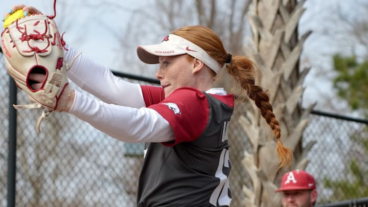 Arkansas Razorbacks Payton Burnham delivering a pitch against the Akron Zips at the Kickin' Chicken Classic in Conway, S.C.