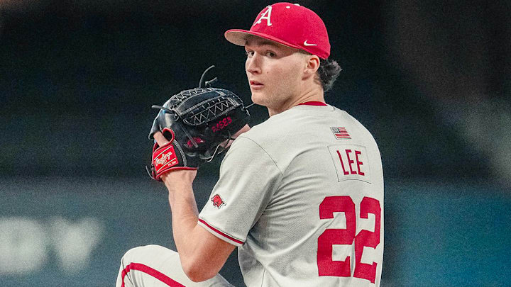 Arkansas Razorbacks pitcher Peyton Lee on the mound against the Tarleton State Texans at Globe Life Field in Arlington, Texas. Arkansas Razorbacks pitcher Peyton Lee on the mound against the Tarleton State Texans at Globe Life Field in Arlington, Texas.