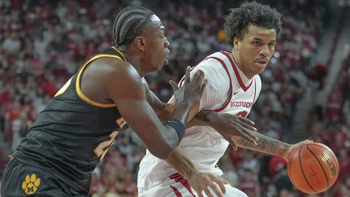 Arkansas Razorbacks forward Malique Ewin drives against the Missouri Tigers in a game at Bud Walton Arena in Fayetteville, Ark.