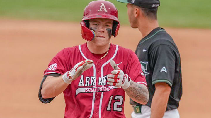 Razorbacks Carter Rutenbar after reaching second against Stetson.