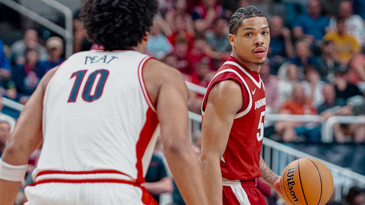 Arkansas Razorbacks' Darius Acuff against the Arizona Wildcats in the Sweet 16 of the NCAA Tournament in San Jose, Calif. Arkansas Razorbacks' Darius Acuff against the Arizona Wildcats in the Sweet 16 of the NCAA Tournament in San Jose, Calif.