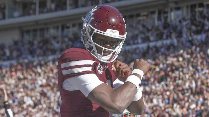 Mississippi State Bulldogs quarterback Kamario Taylor (1) celebrates after scoring a touchdown against the Ole Miss Rebels in the first half at Davis Wade Stadium at Scott Field in Starkville, Miss.