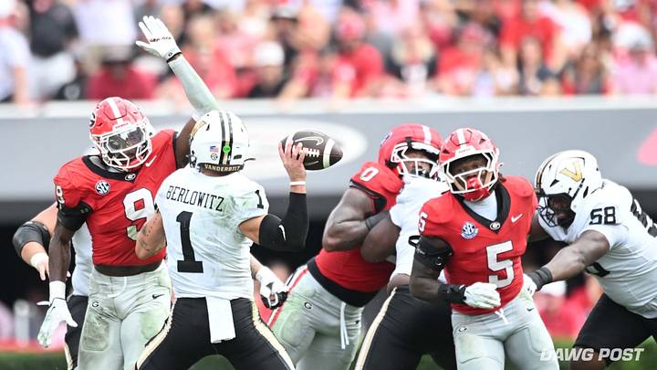 Sanford Stadium; Athens, Georgia; 10/03/2026; Georgia linebackers Chris Cole and Raylen Wilson pressure Vanderbilt quarterback Blaze Berlowitz in the first half. 