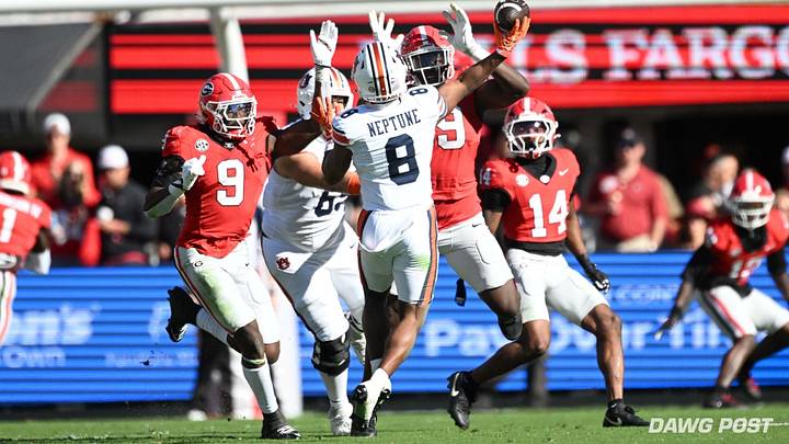 Oct. 17, 2026; Sanford Stadium, Athens, Georgia; Auburn wide receiver Christian Neptune (8) throws a touchdown pass against the Georgia Bulldogs. Oct. 17, 2026; Sanford Stadium, Athens, Georgia; Auburn wide receiver Christian Neptune (8) throws a touchdown pass against the Georgia Bulldogs.