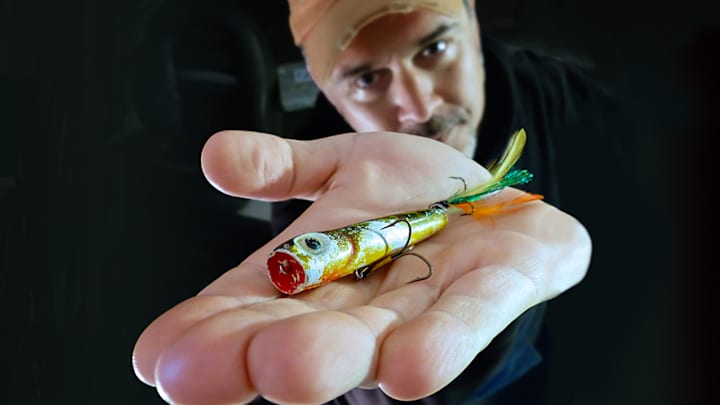 The author with a well-worn bullfrog-colored Chug Bug lure, known as ‘Money’. The author with a well-worn bullfrog-colored Chug Bug lure, known as ‘Money’.