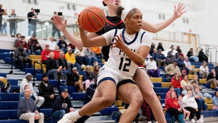 Principia junior guard Nya Walker attacking the basket during a game earlier in the season. 