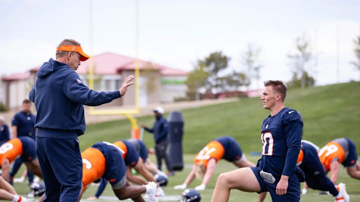 Denver Broncos head coach Sean Payton and quarterback Bo Nix at rookie minicamp. Denver Broncos head coach Sean Payton and quarterback Bo Nix at rookie minicamp.