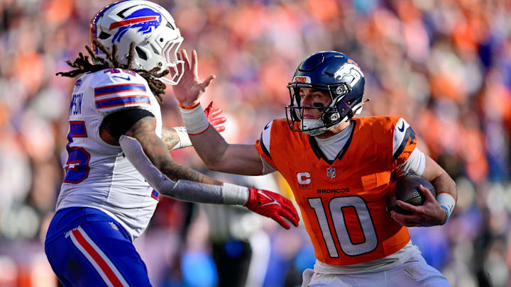 DENVER, CO - JANUARY 17: Denver Broncos quarterback Bo Nix (10) is tackled by Buffalo Bills linebacker Shaq Thompson (45) in the first quarter of the AFC Divisional Round game at Empower Field at Mile High on January 17, 2026 in Denver, Colorado. 