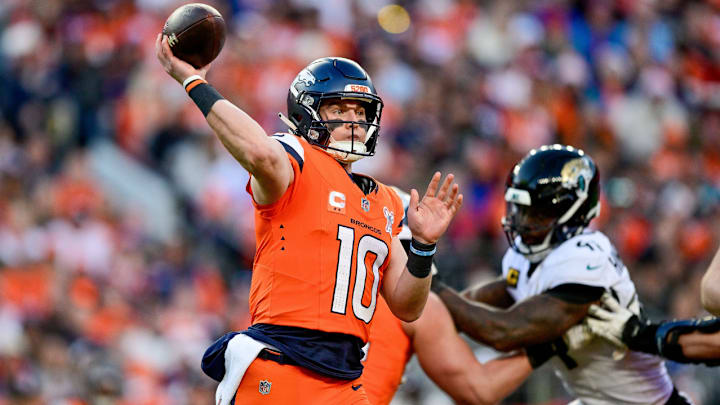 DENVER, CO - DECEMBER 21: Denver Broncos quarterback Bo Nix (10) passes in the second quarter during a game between the Jacksonville Jaguars and the Denver Broncos at Empower Field at Mile High on December 21, 2025 in Denver, Colorado. 