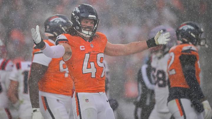 DENVER, CO - JANUARY 25: Denver Broncos linebacker Alex Singleton (49) asks the crowd for noise as he plays defense in the fourth quarter against the New England Patriots the AFC Championship Game at Empower Field at Mile High on January 25, 2026 in Denver, Colorado.