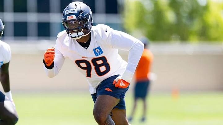 Denver Broncos rookie defensive lineman Tyler Onyedim runs a drill at rookie minicamp Denver Broncos rookie defensive lineman Tyler Onyedim runs a drill at rookie minicamp