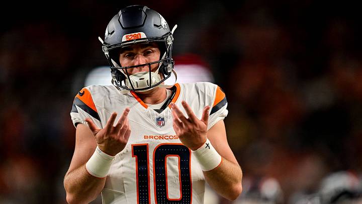 DENVER, CO - AUGUST 21: Denver Broncos quarterback Bo Nix (10) looks on in the bench area in the first half during a preseason game between the Green Bay Packers and the Denver Broncos at Empower Field at Mile High on August 21, 2026 in Denver, Colorado. 