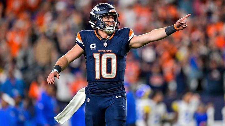 DENVER, CO - SEPTEMBER 27: Denver Broncos quarterback Bo Nix (10) celebrates after a defensive penalty was called against the Los Angeles Rams in the fourth quarter during a game between the Los Angeles Rams and the Denver Broncos at Empower Field at Mile High on September 27, 2026 in Denver, Colorado. DENVER, CO - SEPTEMBER 27: Denver Broncos quarterback Bo Nix (10) celebrates after a defensive penalty was called against the Los Angeles Rams in the fourth quarter during a game between the Los Angeles Rams and the Denver Broncos at Empower Field at Mile High on September 27, 2026 in Denver, Colorado.