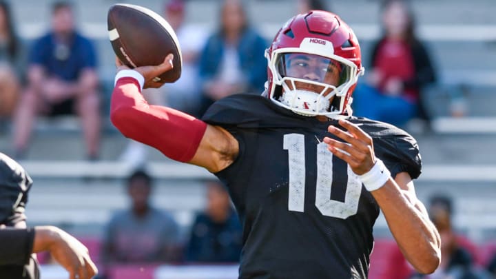 Arkansas Razorbacks quarterback Taylen Green throwing a pass in warmups before the scrimmage Saturday morning at Razorback Stadium in Fayetteville, Ark.