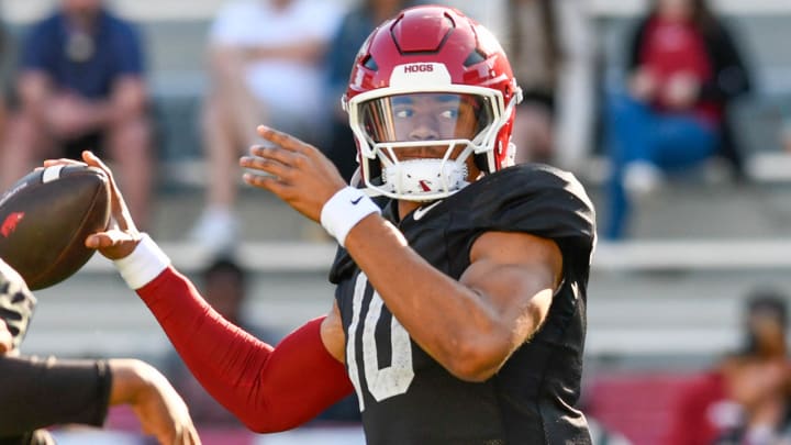 Arkansas Razorbacks quarterback Taylen Green throwing a practice in warmups at a spring scrimmage at Razorback Stadium in Fayetteville, Ark.