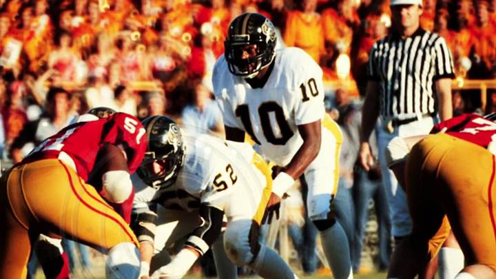 Southern Miss legend Reggie Collier surveys the defense while under center in the Golden Eagles' 1981 season. Southern Miss legend Reggie Collier surveys the defense while under center in the Golden Eagles' 1981 season.