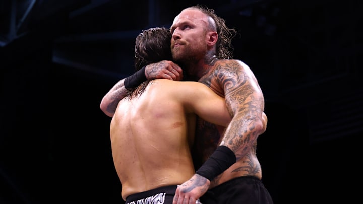 Malakai Black hugs Adam Cole after his loss on Dynamite