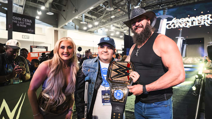 Braun Strowman and Tiffany Stratton at a WWE Fanatics event for Make-A-Wish
