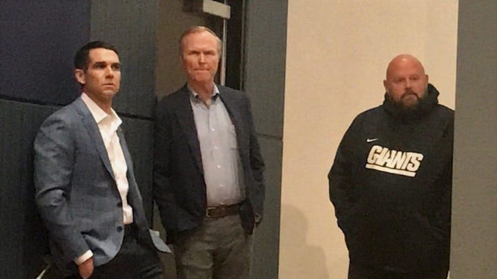 New York Giants brass watches first-round pick Deonte Banks during his introductory news conference