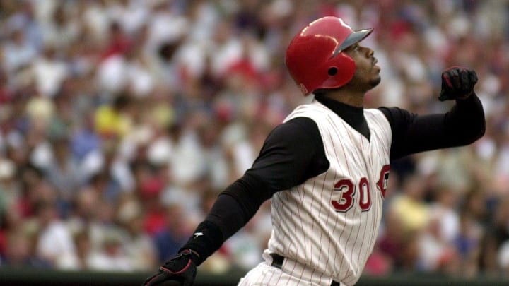 JUNE 26, 2000: Ken Griffey Jr. watches his ball fly over the fence for a 2-run home run in the first inning against the St. Louis Cardinals Monday at Cinergy Field.

Text 2000 06 26 08 02 Reds Sports Nikon Digital Image The Cincinnati Reds Ken Griffey Jr Watches His Ball Fly Over The Fence For A 2 Run Homerun Bringing In Teammate Dmitre Young In The 1st Inning Against The St Louis Cardinals Monday At Cinergy Field Jeff Swinger Cincinnati Enquirer Js