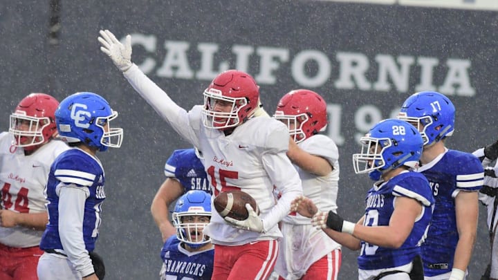 Trey Cosnowski signals Orchard Lake St. Mary's recovered a fumble against Catholic Central. Detroit