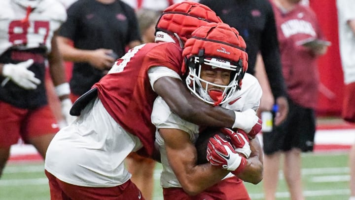 Arkansas Razorbacks wide receiver Isaiah Sategna after making a catch in practice last year at the outdoor practice fields in Fayetteville, Ark. Arkansas Razorbacks wide receiver Isaiah Sategna after making a catch in practice last year at the outdoor practice fields in Fayetteville, Ark.
