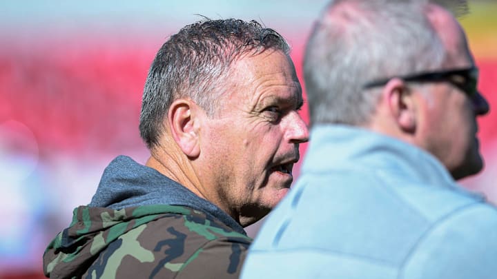 Arkansas Razorbacks coach Sam Pittman talking with athletics director Hunter Yurachek at a spring practice inside Razorback Stadium in Fayetteville, Ark.