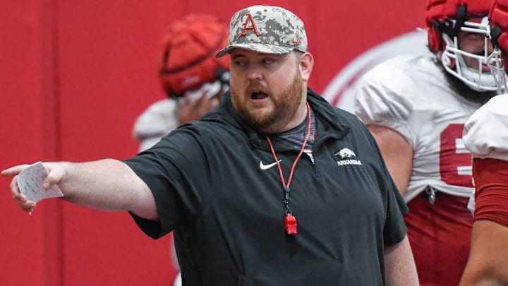 Arkansas Razorbacks offensive line coach Eric Mateos during a spring practice on the indoor field at Fayetteville, Ark.