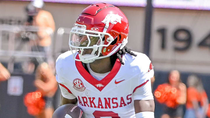 Arkansas Razorbacks wide receiver Andrew Armstrong turns up field after making a catch against Oklahoma State.